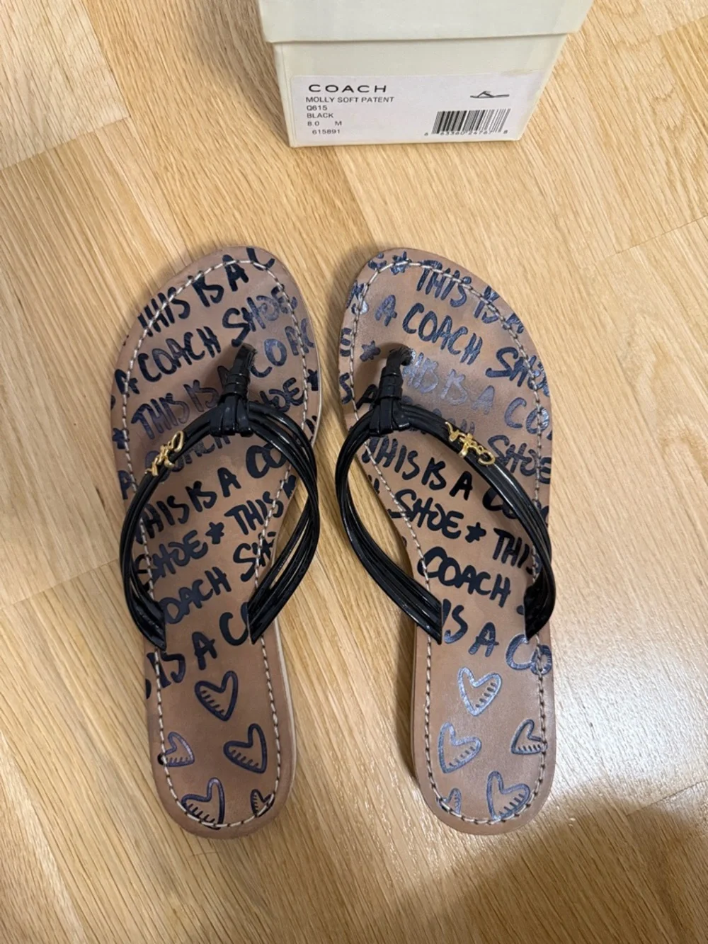 Coach Brown Logo Print Flip Flop Sandals with Black Glossy Straps and Gold Charm - Picture 3 of 5